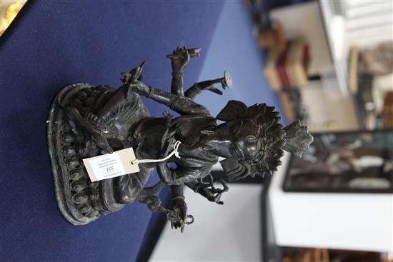 Three bronze Hindu groups, 16cm -32cm high